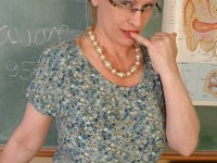 Mature teacher Lavender with big saggy tits gets naked in the classroom - Photo #1