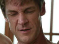 Sexy blonde exercises a naked man's flexibility while dominating him - Photo #12
