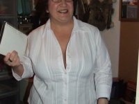 Granny Kinky Carol reveals her huge tits and phat ass in black lingerie - Photo #1