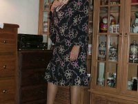 Fat grandmother with blonde hair exposes herself in tan nylons and garters - Photo #1