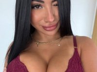 Solo girl with dark hair and tattoos frees her big butt from sensual lingerie - Photo #1