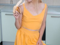 Sexy amateur doll Sati strips & shows her hairy coochie after eating a banana - Photo #1