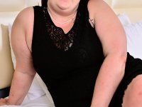Fat Canadian housewife Nikki Hayze kisses her toy boy before fucking - Photo #2