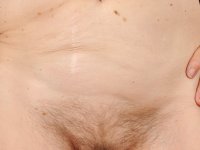 Skinny granny Cassie strips naked and spreads her hairy cunt up close - Photo #9