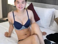 Attractive Asian Sprite strips and shows her big tits & pussy at a casting - Photo #6