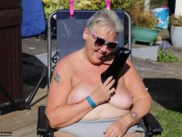 Fat nan Valgasmic Exposed licks a shoe while exposing herself in the backyard - Photo #4