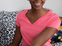 Charming black babe Ashlee L shows her small tits and toys her hairy pussy - Photo #1