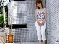 Young Japanese girl Akari shyly puts her hairy muff on display - Photo #1