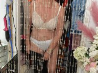 Old blonde woman strips to her underwear during a solo performance - Photo #16