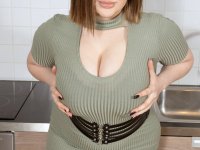 BBW Molly Evans strips naked & shows off her enormous tits & her shaved pussy - Photo #1