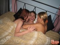 Young bisexed girls hop into bed with their fuck buddy for a threesome - Photo #2