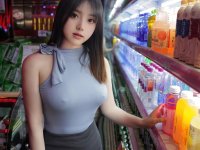 Asian beauty sports a sheer robe in a tempting manner after changing - Photo #1