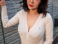 Japanese lady Ayane frees her big tits before standing naked in a kitchen - Photo #1
