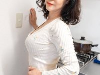 Japanese lady Ayane frees her big tits before standing naked in a kitchen - Photo #9
