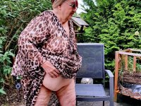 Morbidly obese old woman steps out onto a patio while totally naked - Photo #10