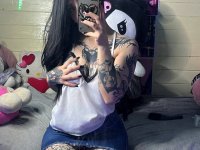 Brunette teen takes selfies while stripping to her thong on a bed - Photo #11