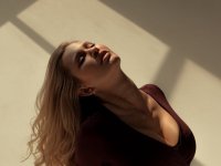 Solo model poses for non-nude shoots in black and orange dresses - Photo #6