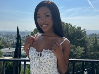 Pretty black girl takes a day trip with her feet and pussy bare - Photo #1