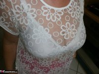 Kinky amateur mature woman Caro reveals and pleases her wolf hairy twat - Photo #1