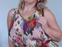 Older blonde woman blows a kiss after stripping to her jewelry - Photo #2