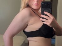 Blonde amateur takes selfies while going topless in a thong and nylon panties - Photo #1