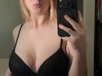 Blonde amateur takes selfies while going topless in a thong and nylon panties - Photo #2