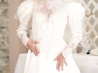 Carolina Sweets is affixed with a garter before a lesbian wedding to Julia Ann - Photo #2