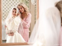 Carolina Sweets is affixed with a garter before a lesbian wedding to Julia Ann - Photo #14
