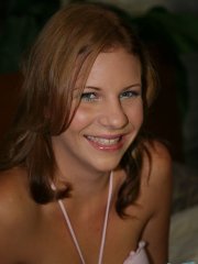 Slim teen pornstar Jizelle Ryder shows her tiny boobs and teases a dick