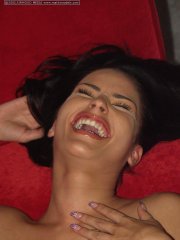 Dark haired amateur Isabella takes a smoke break while modeling in the nude