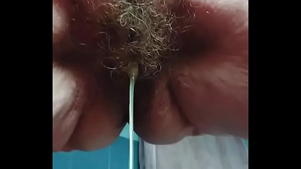Granny with hairy pussy pees