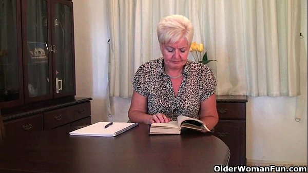 Chubby granny in stockings plays with vibrator