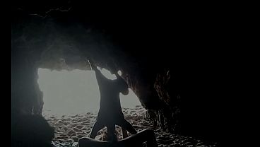 Couple recorded at the beach, inside the cave