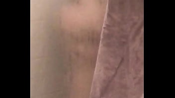 Spy on a hot milf taking a shower