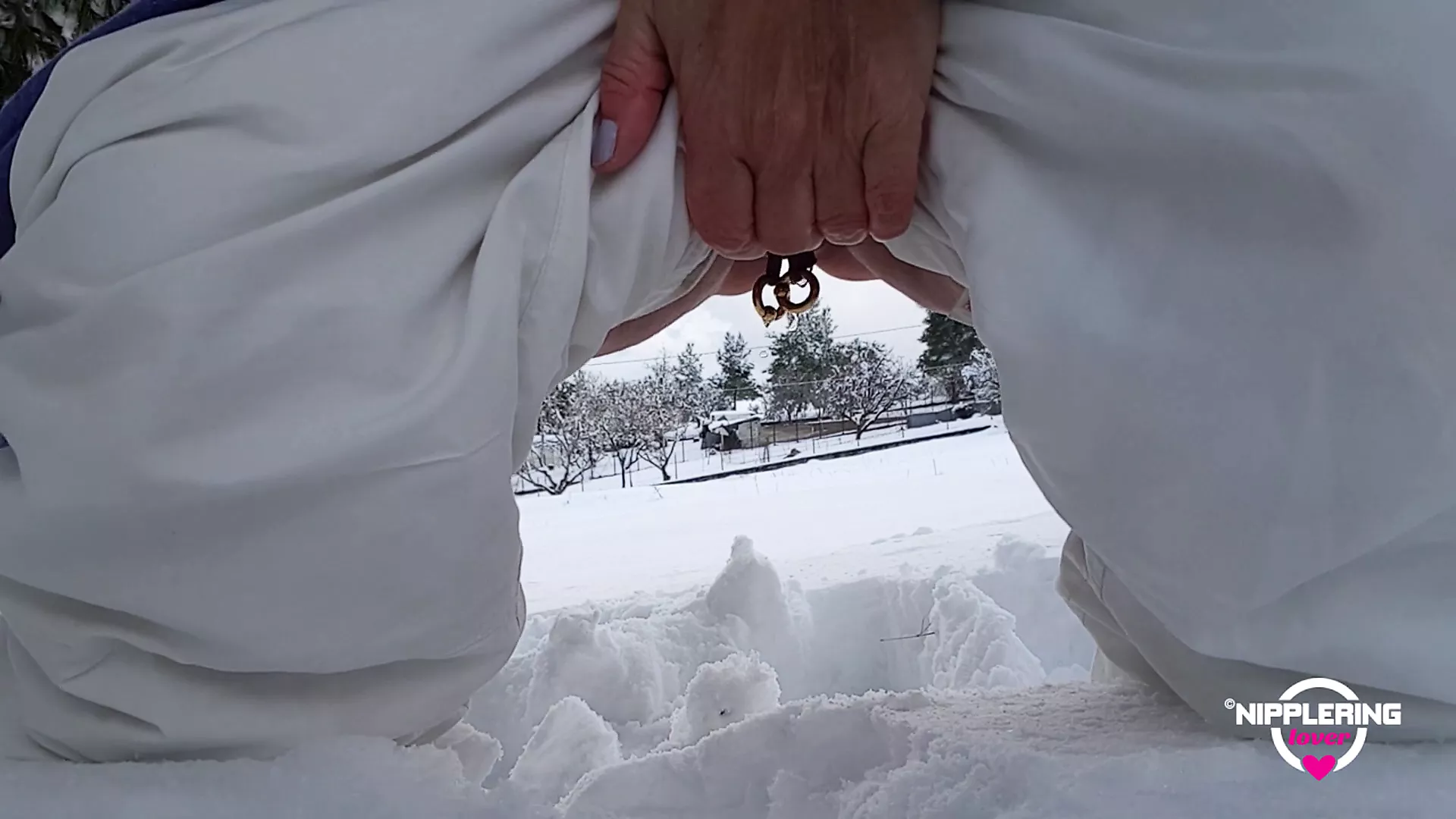 nippleringlover pissing outdoor in snow flashing huge pierced nipples and pierced pussy with stretched pussy lips