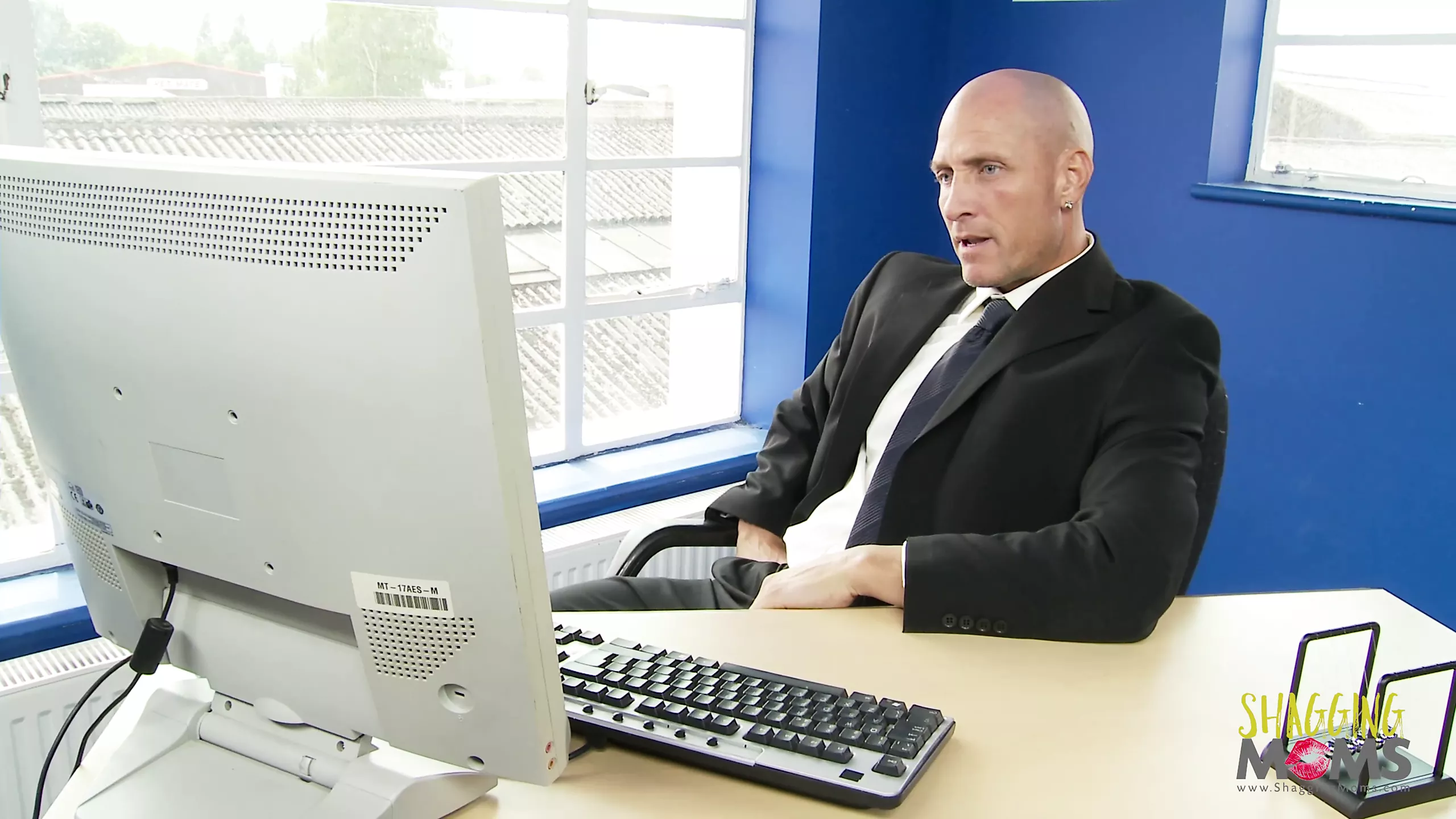 Bald dude fucking a blonde secretary in the office