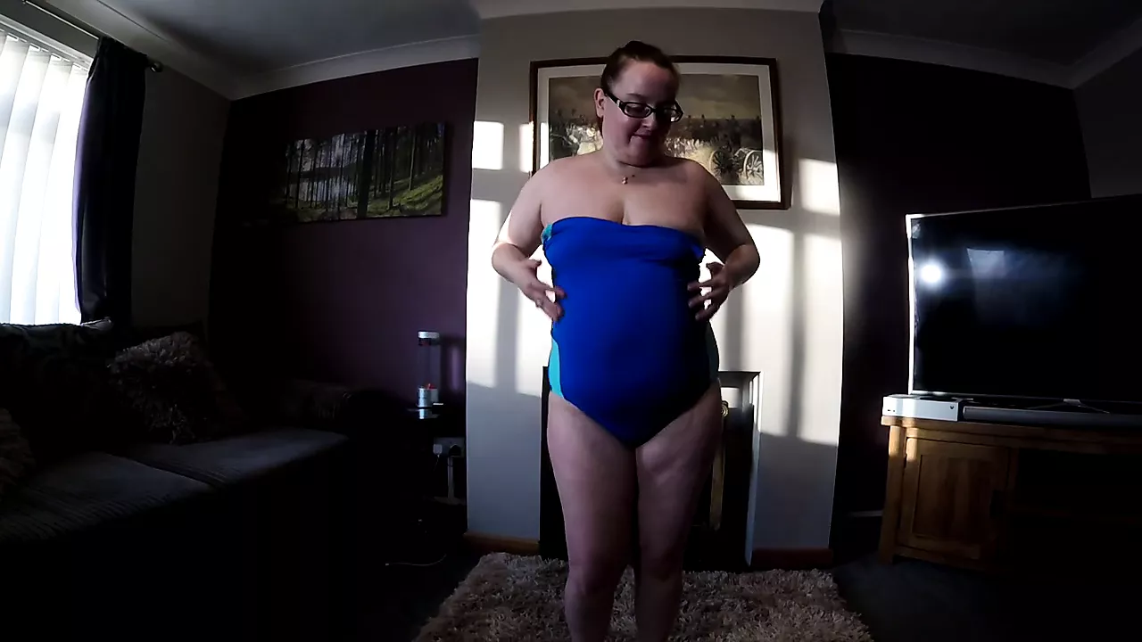 redhead wife dancing in tight swimsuit