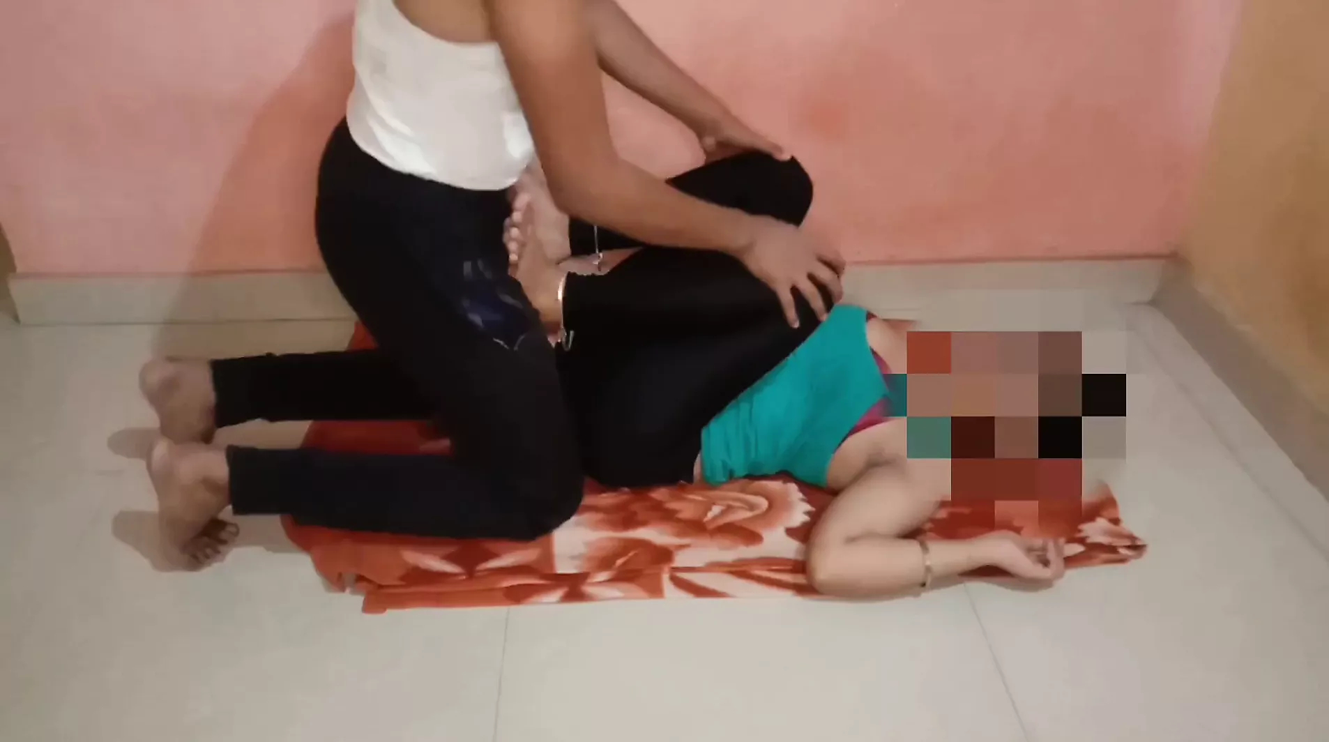 Indian Stepmom is doing yoga and stepson helping to stepmom for best figure