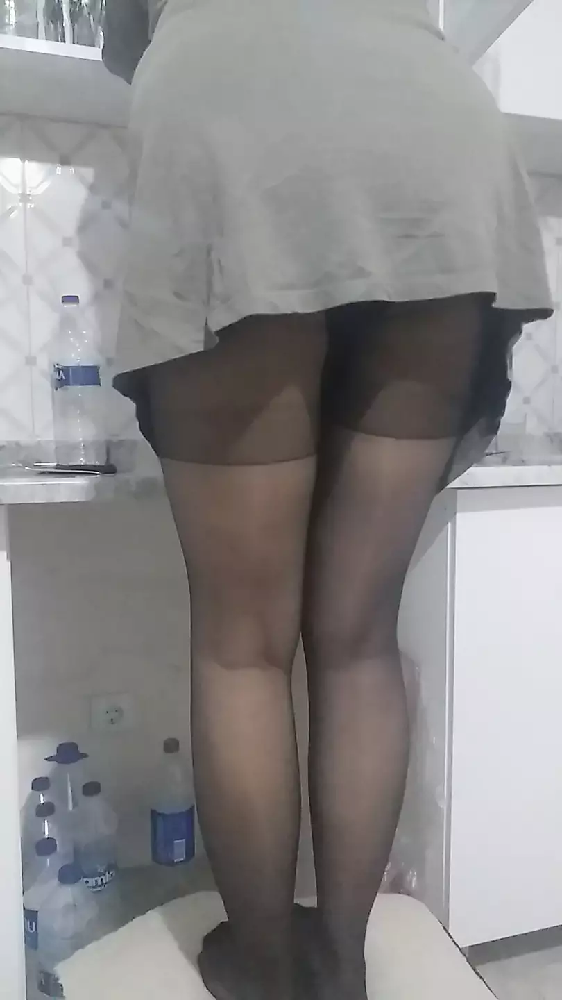Spying while mom messes around in the kitchen