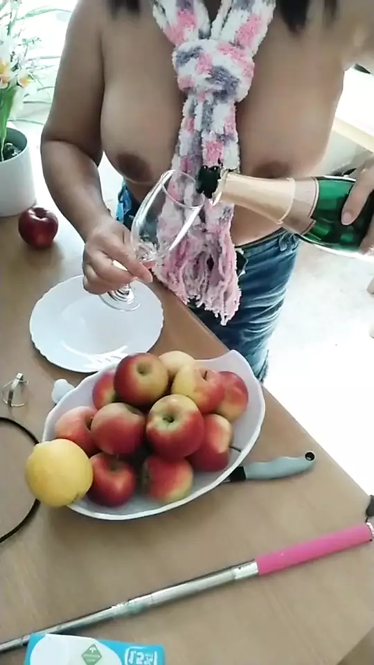 Sexy nice girl with big boobs, champagne and apples