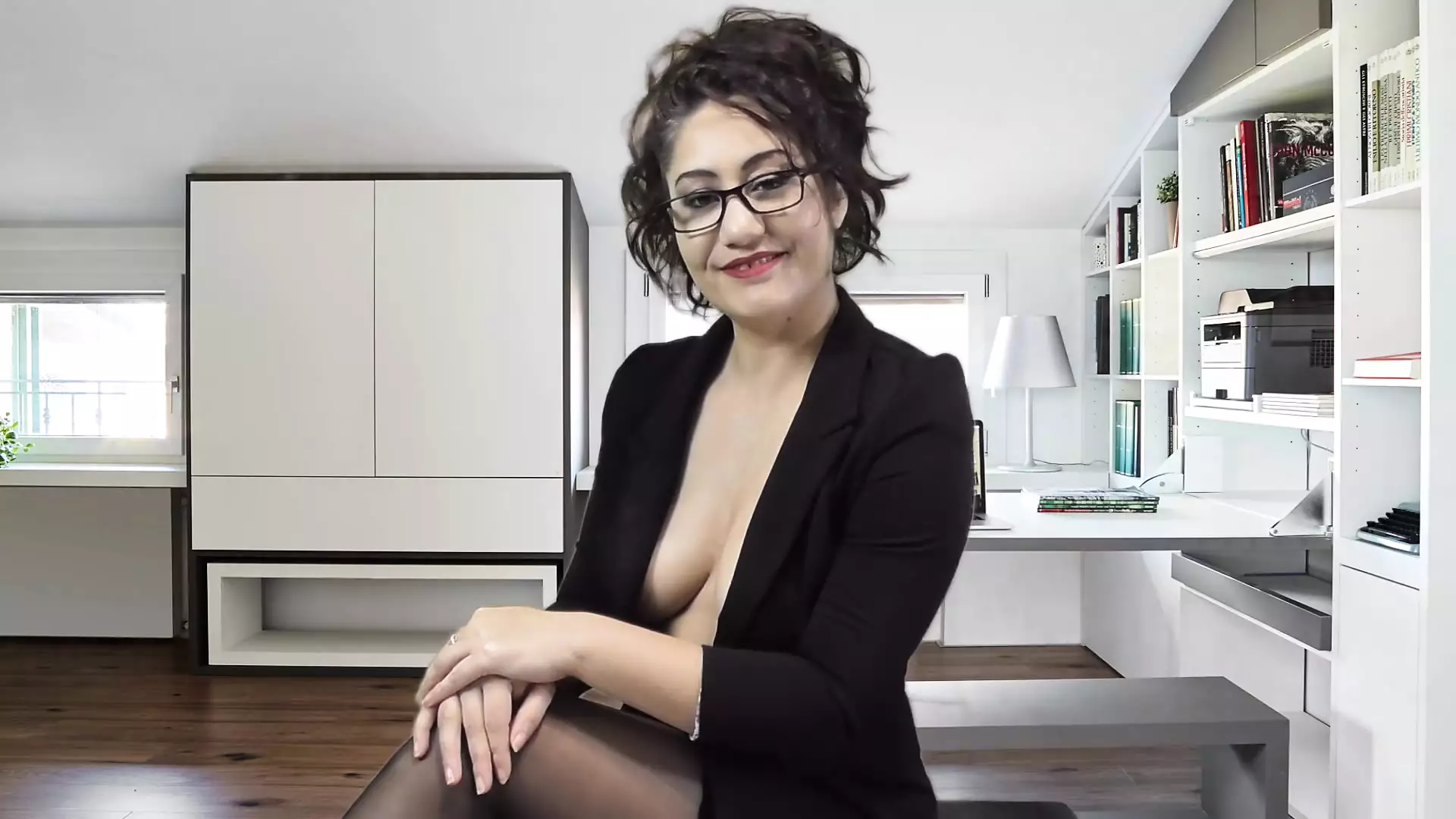 The secretary masturbates for her boss