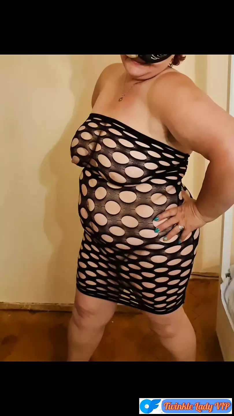 BBW Fat Grandmother shows off with her black lingerie.