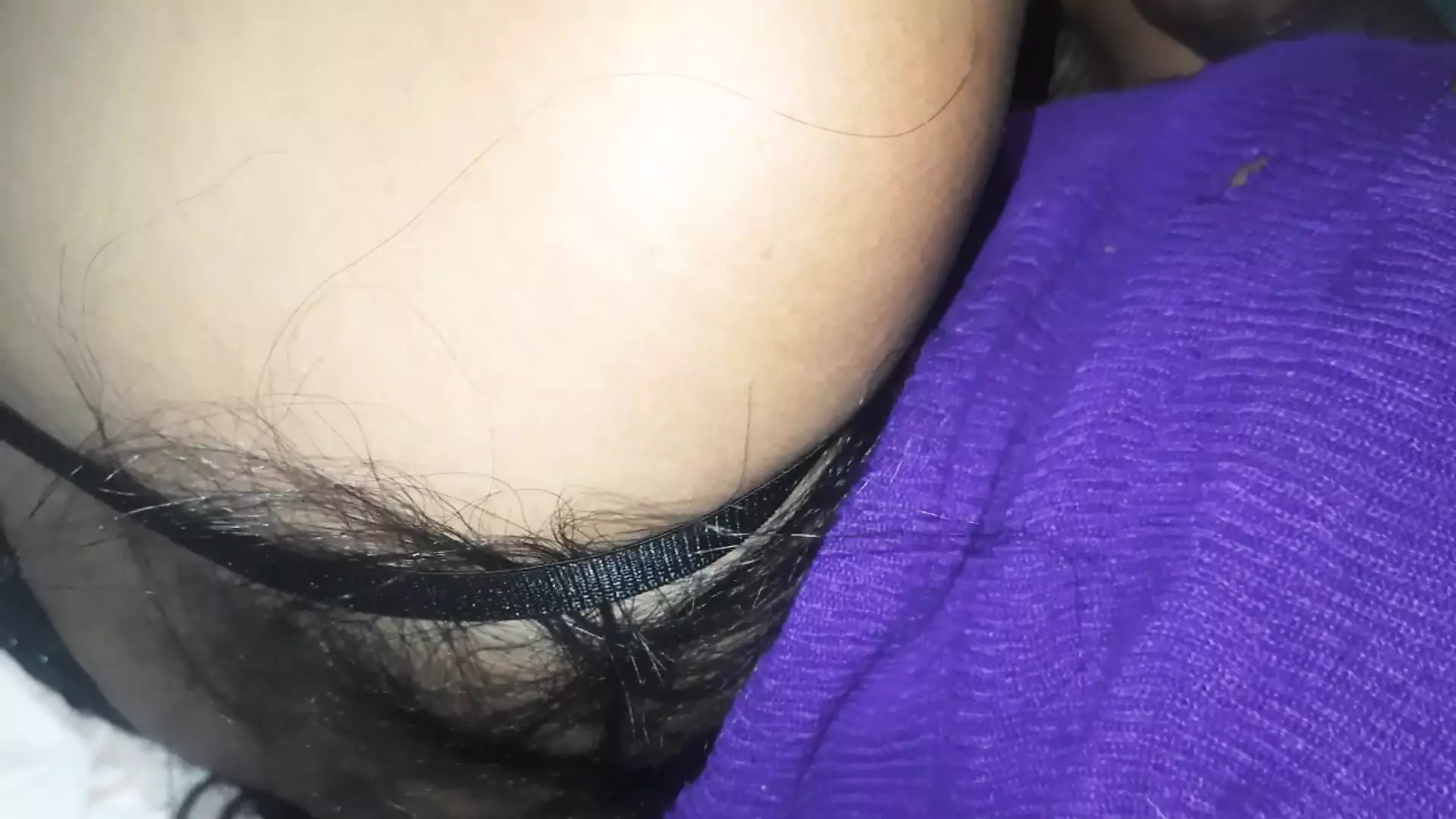 Her husband came to the back of her and rubbed her shaved pussy to thrill her sexual mood.