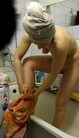 after a shower in a bathrobe