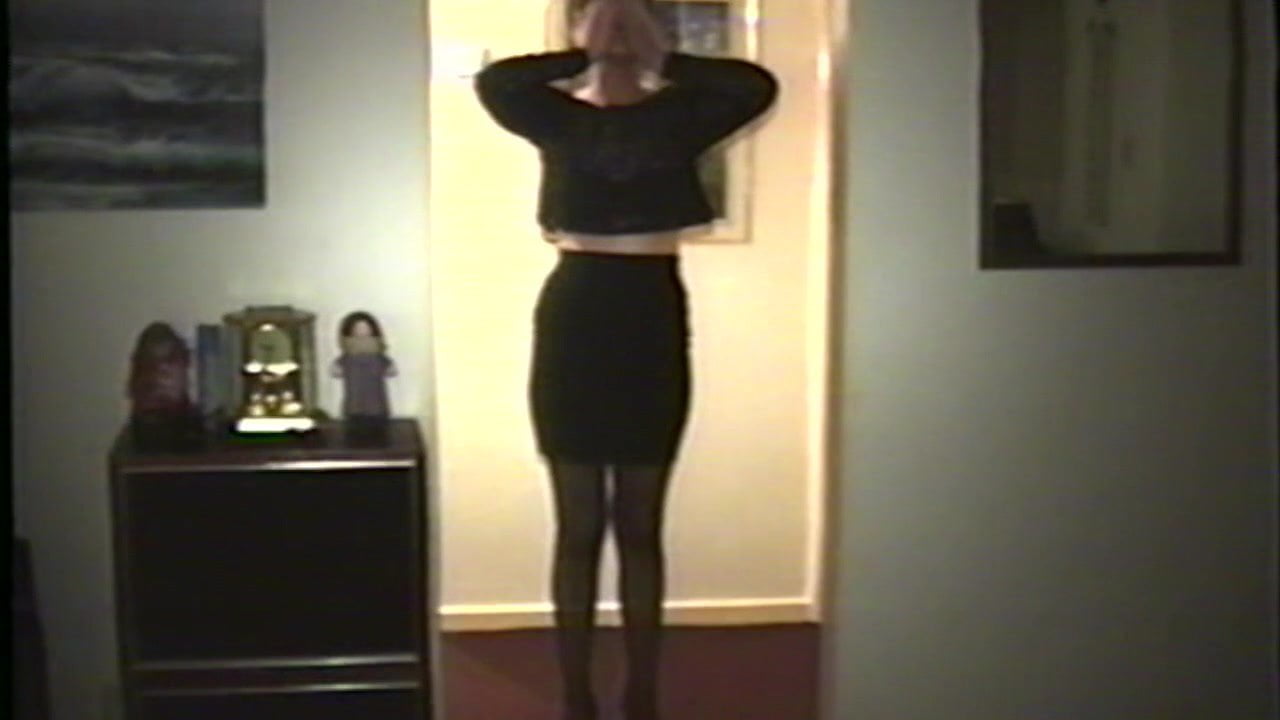 Wife playing dress up for the camera