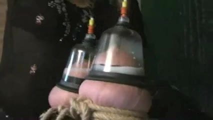 Milking her.