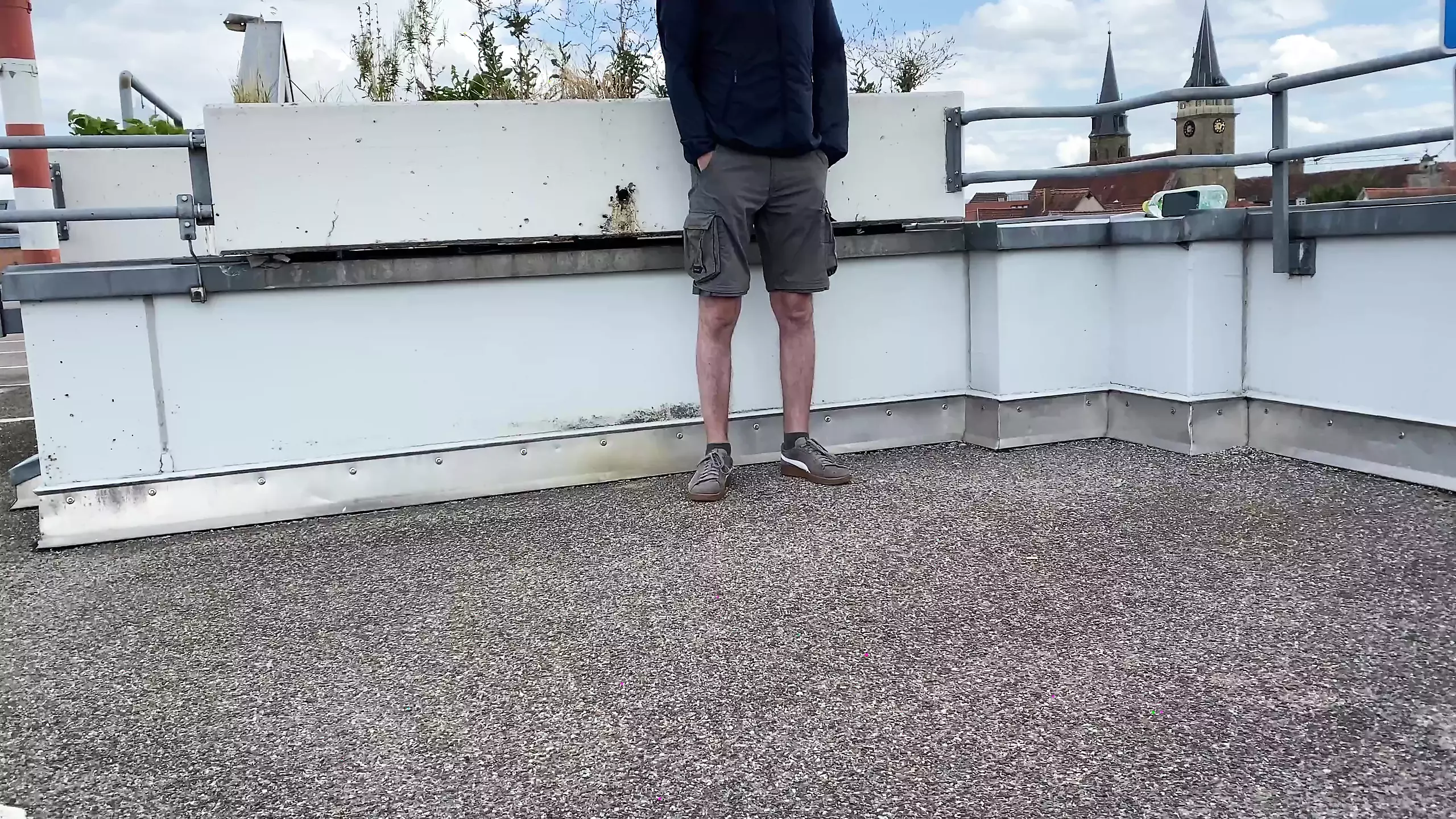 Gorgeous pissing mother-in-law helps son-in-law piss on the top of the parking lot